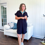 The scoop hem is a flattering fit that is sure to be the star of the show. This black 1/4 zip dress combines comfort with contemporary style, featuring a distinctive scoop hem that creates an elegant silhouette.