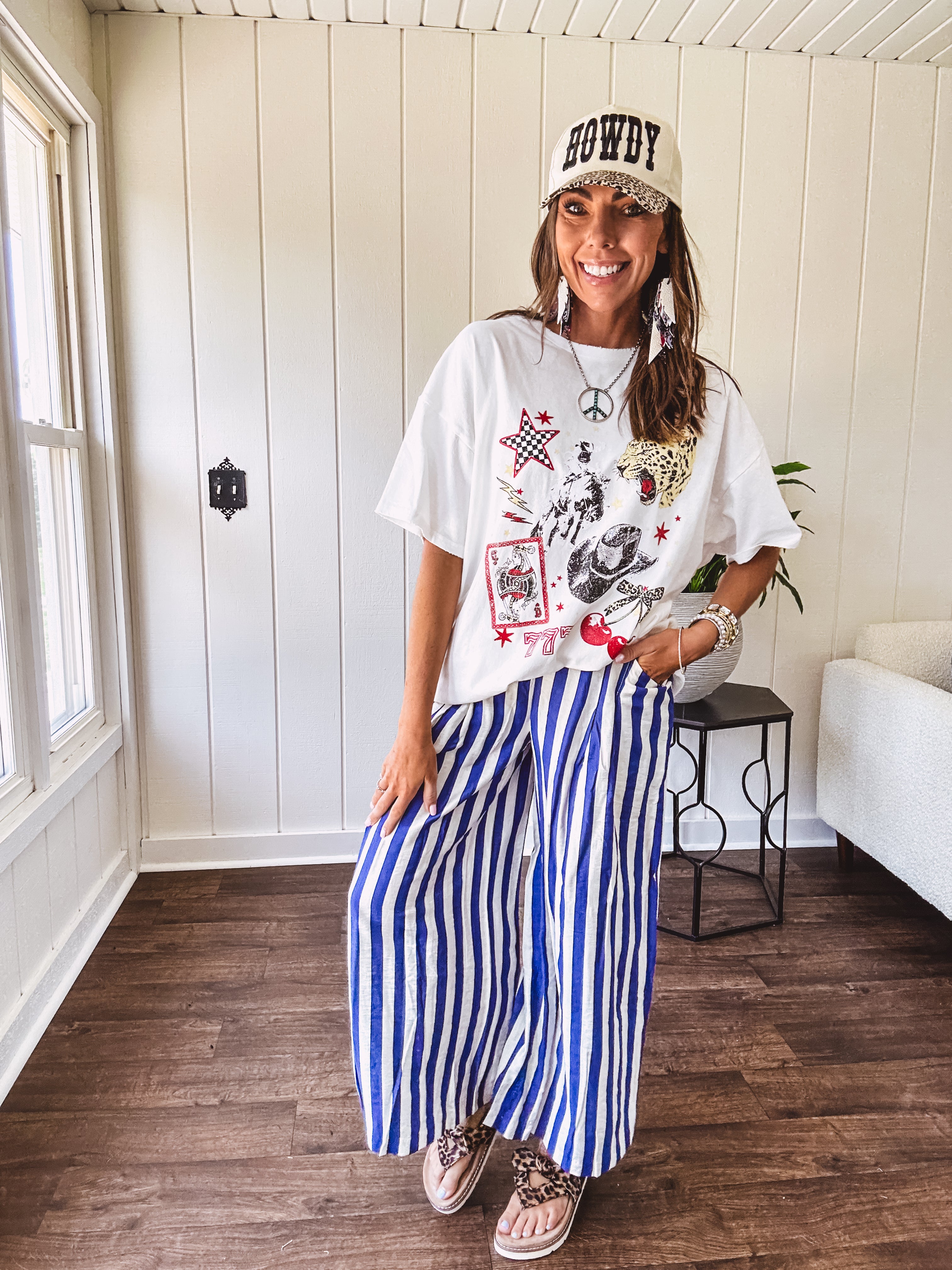 Blue and white striped wide leg pants with elastic back waist and flat front with large side pockets.