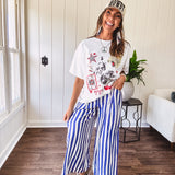 Blue and white striped wide leg pants with elastic back waist and flat front with large side pockets.