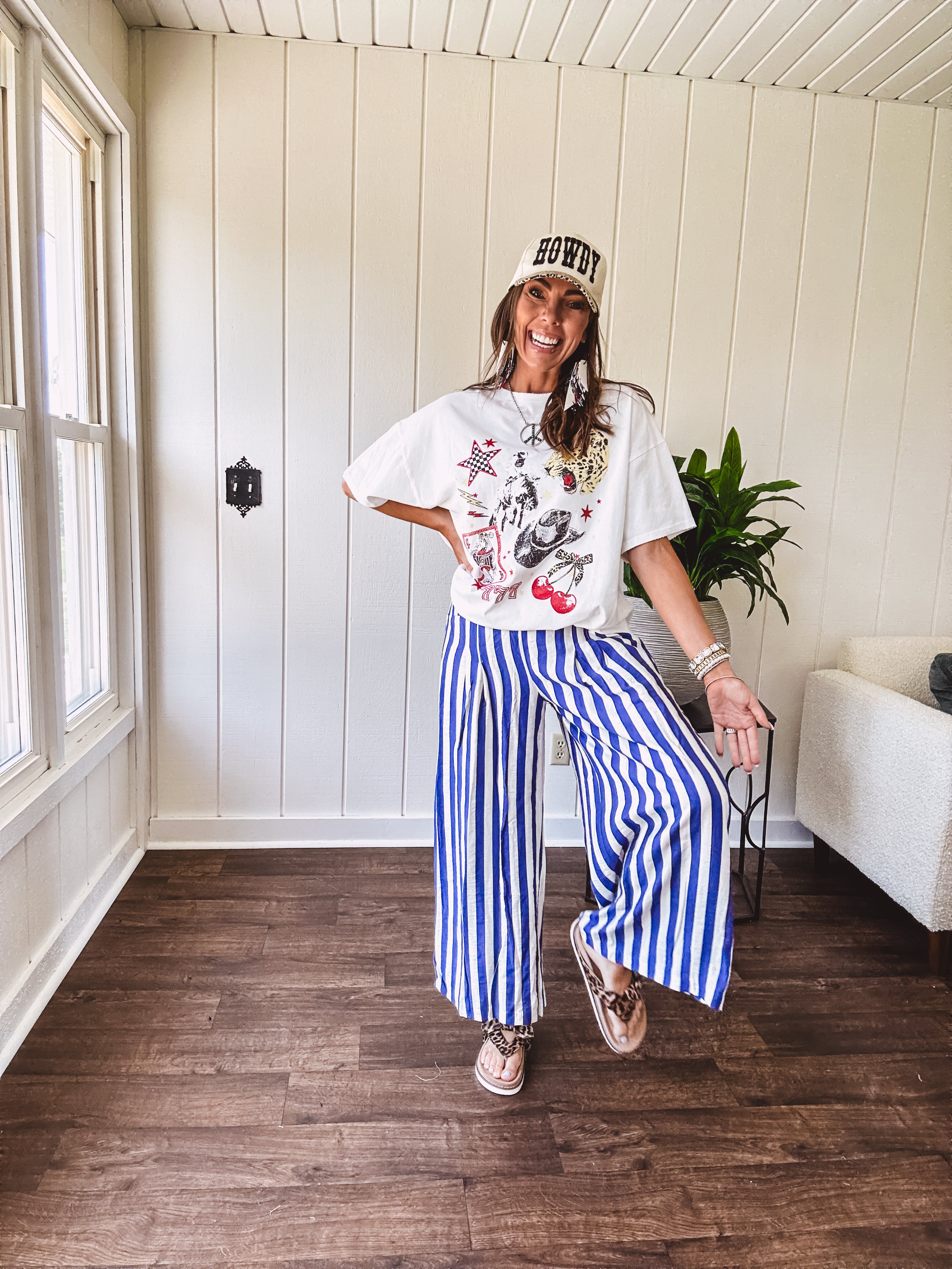 Blue and white striped wide leg pants with elastic back waist and flat front with large side pockets.