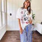 Blue and white striped wide leg pants with elastic back waist and flat front with large side pockets.