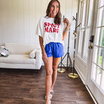 Thin, royal blue athleisure shorts with elastic drawstring waist and pockets.