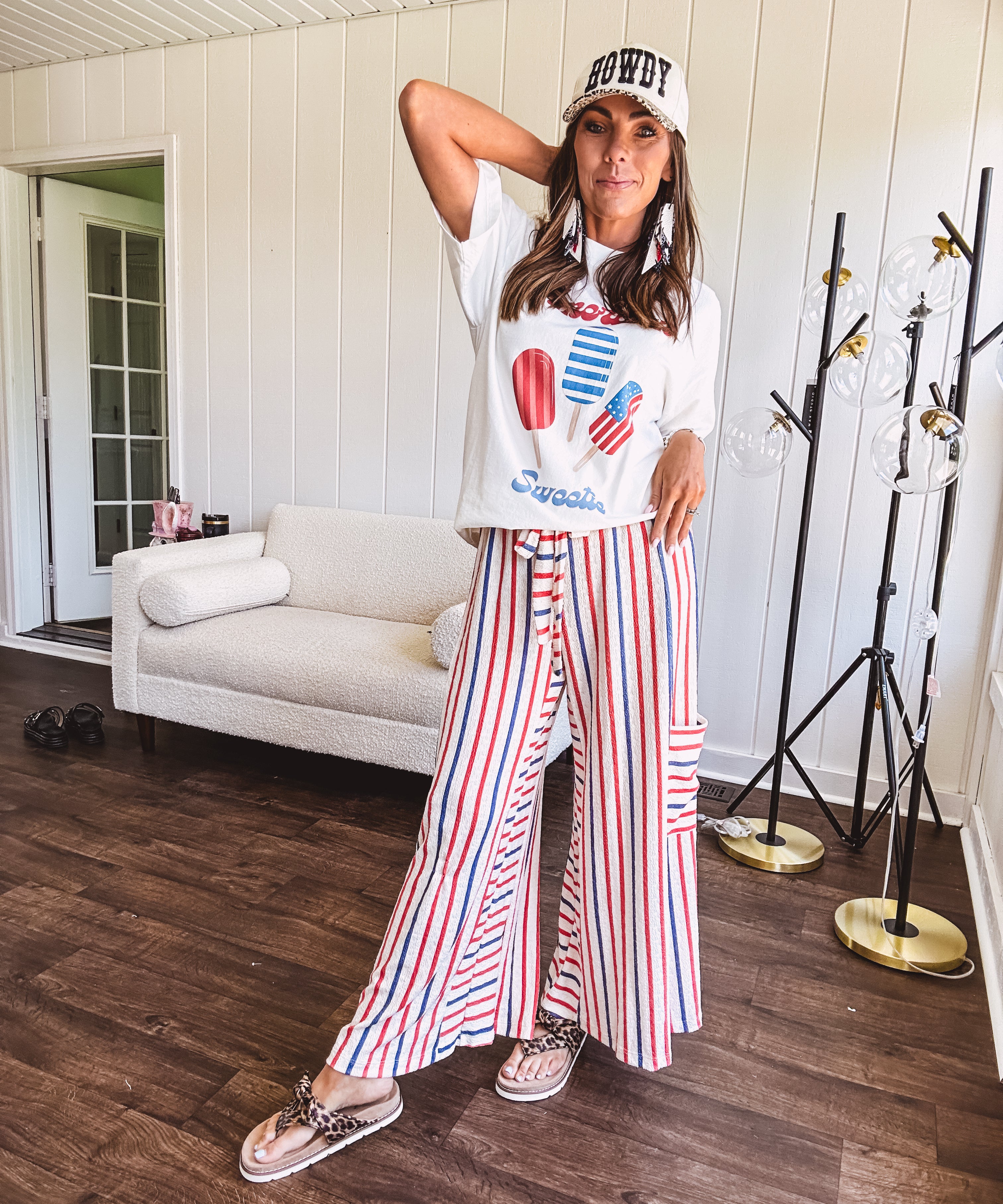 Thin, lightweight textured wide leg pant with red, blue and cream stripes with elastic drawstring waist and side pockets.