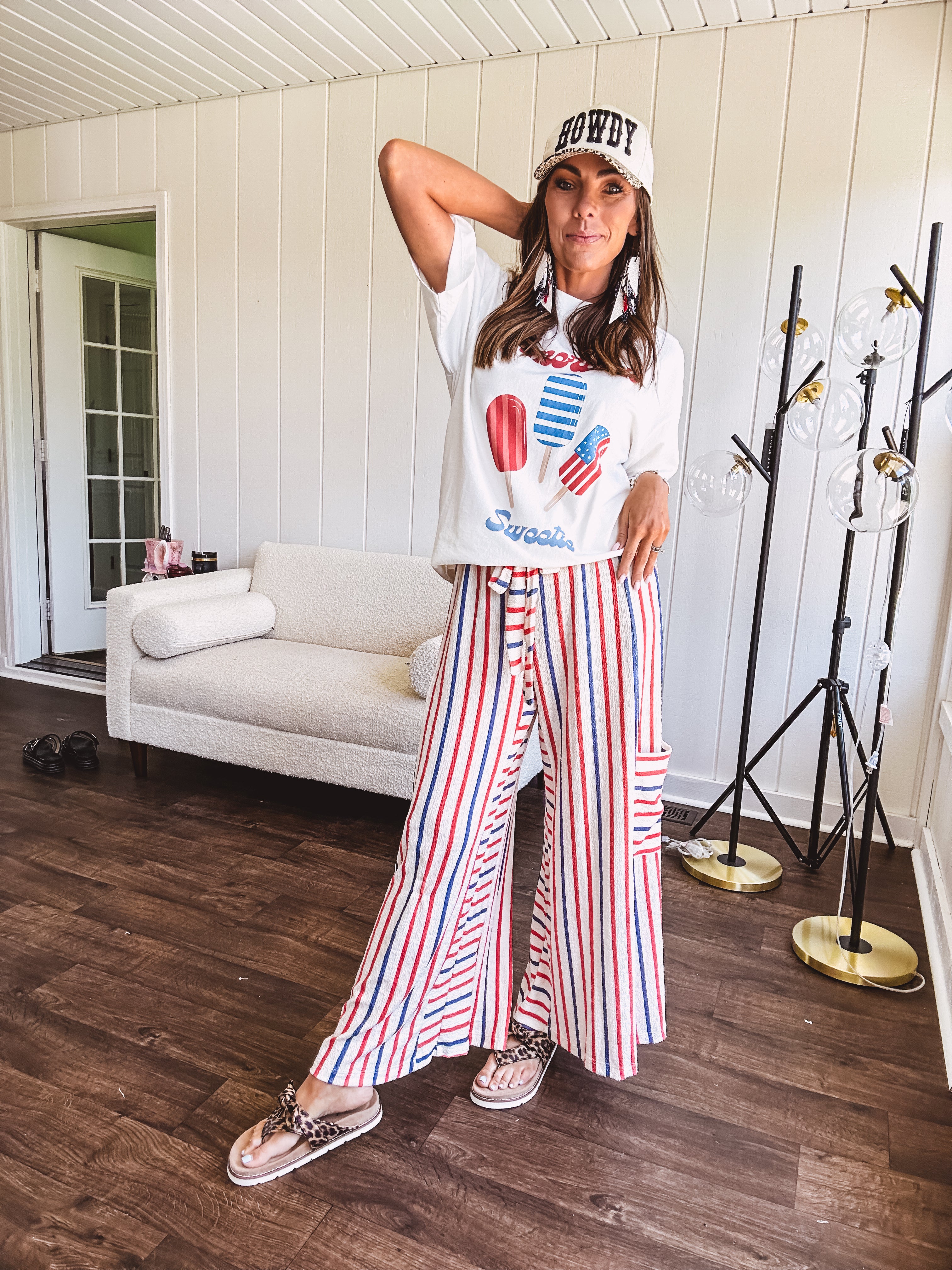 Thin, lightweight textured wide leg pant with red, blue and cream stripes with elastic drawstring waist and side pockets.