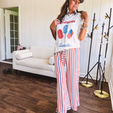 Thin, lightweight textured wide leg pant with red, blue and cream stripes with elastic drawstring waist and side pockets.