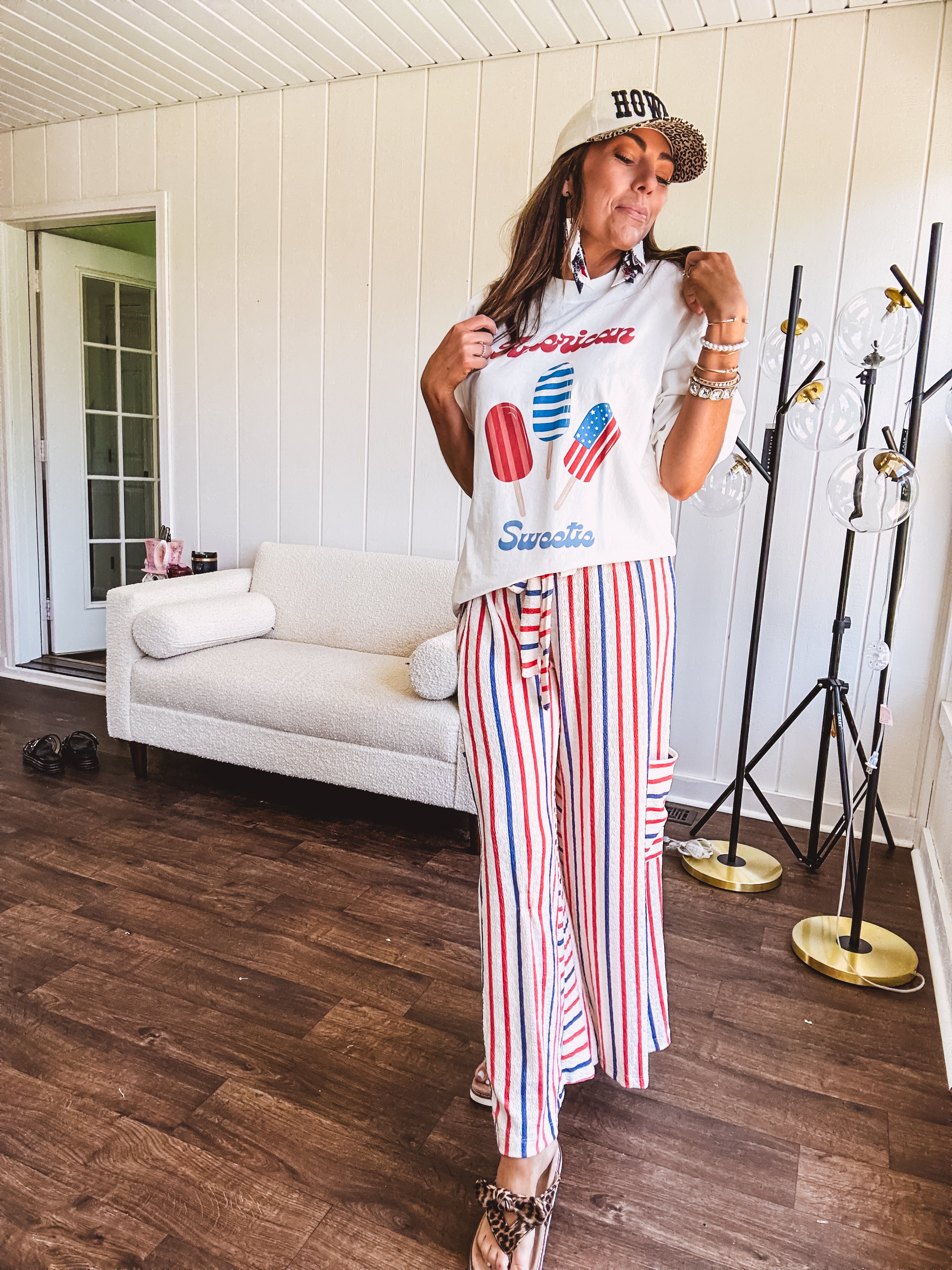Thin, lightweight textured wide leg pant with red, blue and cream stripes with elastic drawstring waist and side pockets.