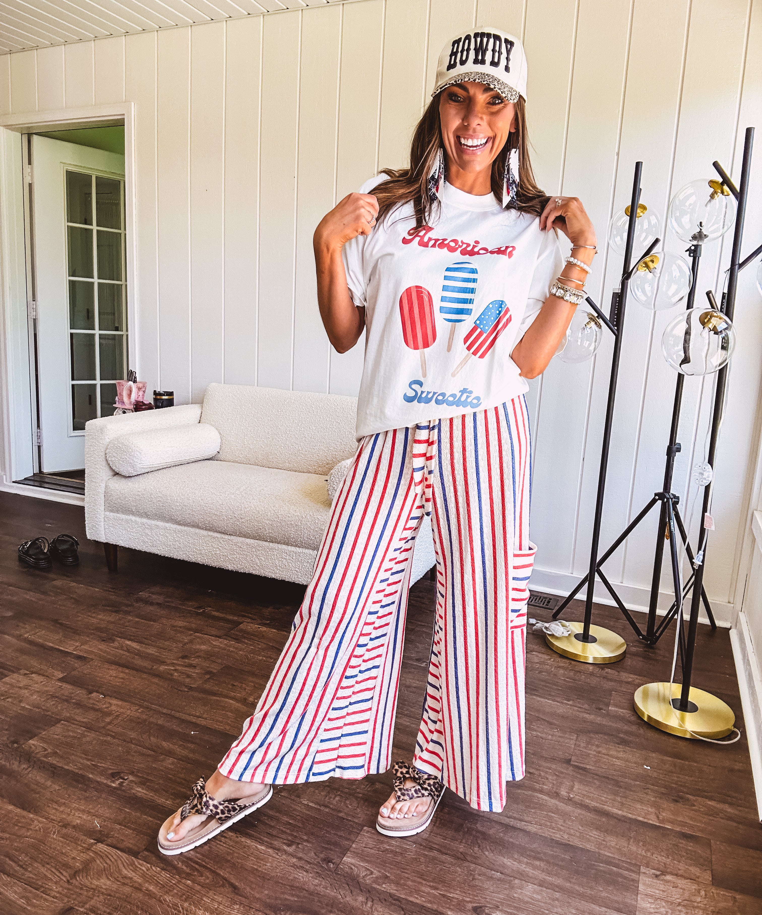 White cotton tee with blue and red "American Sweet" and popsicle graphics on front.