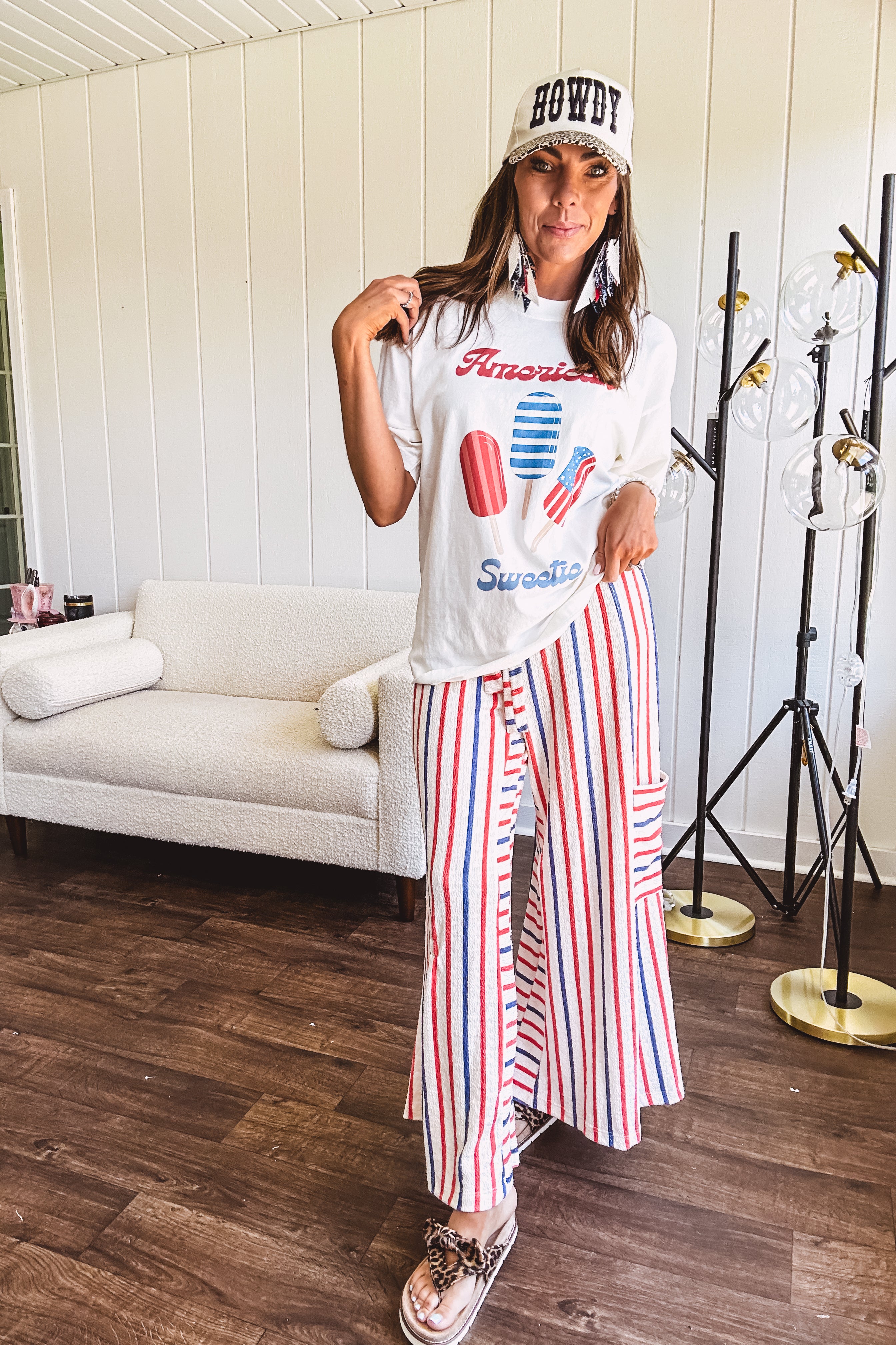 Thin, lightweight textured wide leg pant with red, blue and cream stripes with elastic drawstring waist and side pockets.