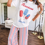 White cotton tee with blue and red "American Sweet" and popsicle graphics on front.
