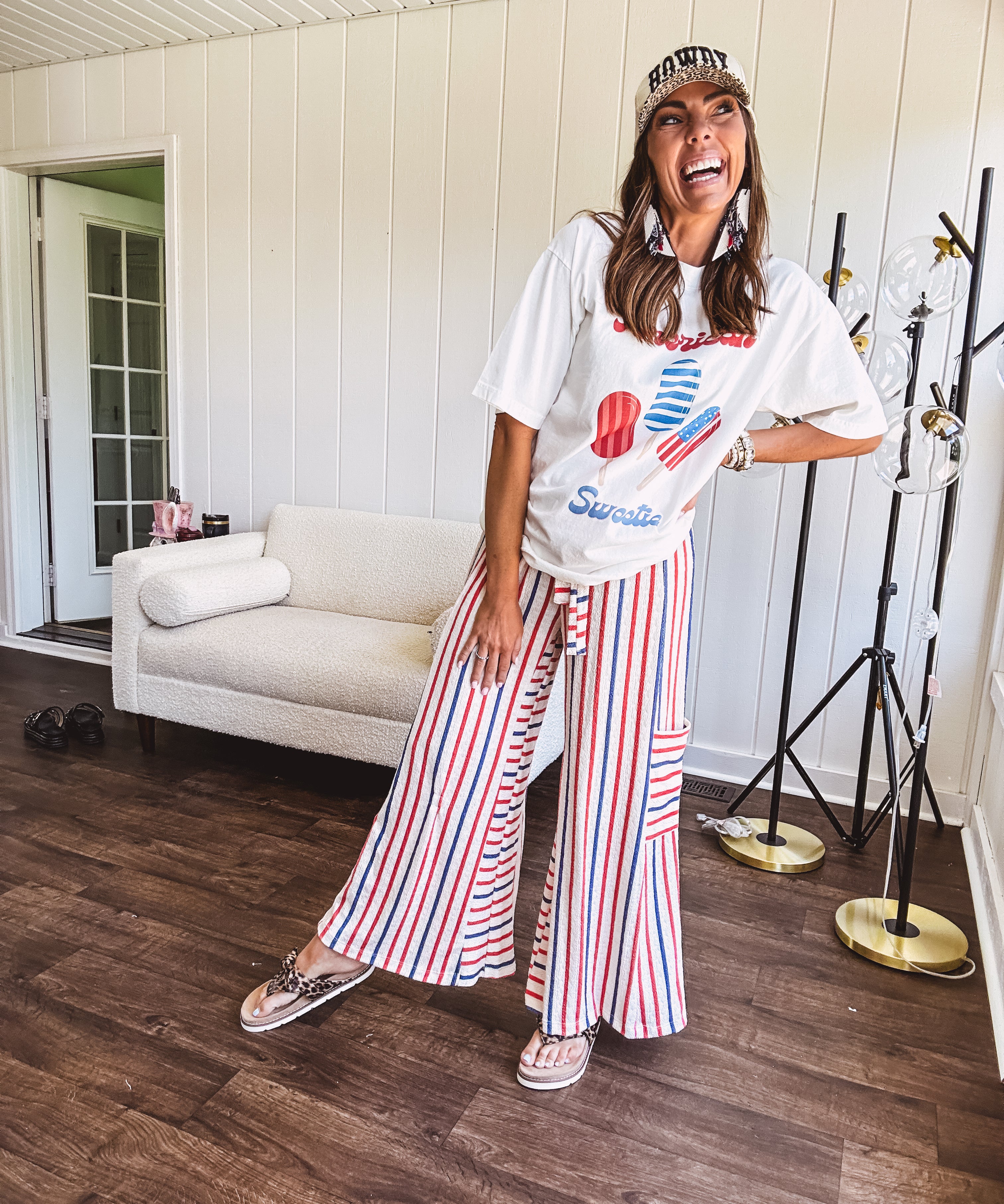 Thin, lightweight textured wide leg pant with red, blue and cream stripes with elastic drawstring waist and side pockets.