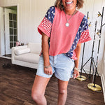 Washed red urban ribbed tee with red and white gingham and navy stars and stripes patchwork down the sides and shoulders.