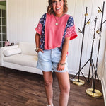 Washed red urban ribbed tee with red and white gingham and navy stars and stripes patchwork down the sides and shoulders.