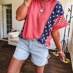 Washed red urban ribbed tee with red and white gingham and navy stars and stripes patchwork down the sides and shoulders.