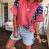 Washed red urban ribbed tee with red and white gingham and navy stars and stripes patchwork down the sides and shoulders.