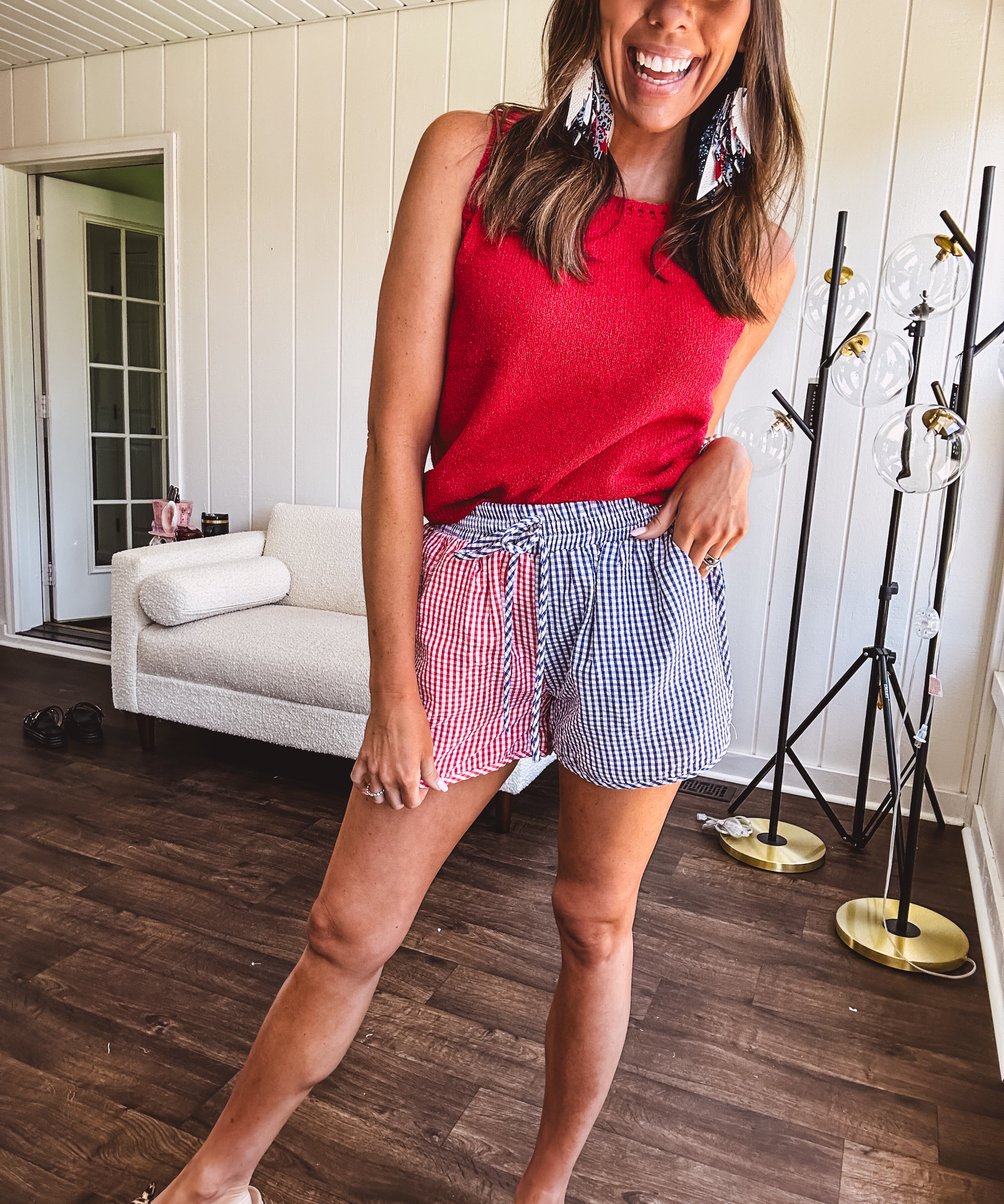 Soft, lightweight knit tank with wide straps and crochet detail at the trim.