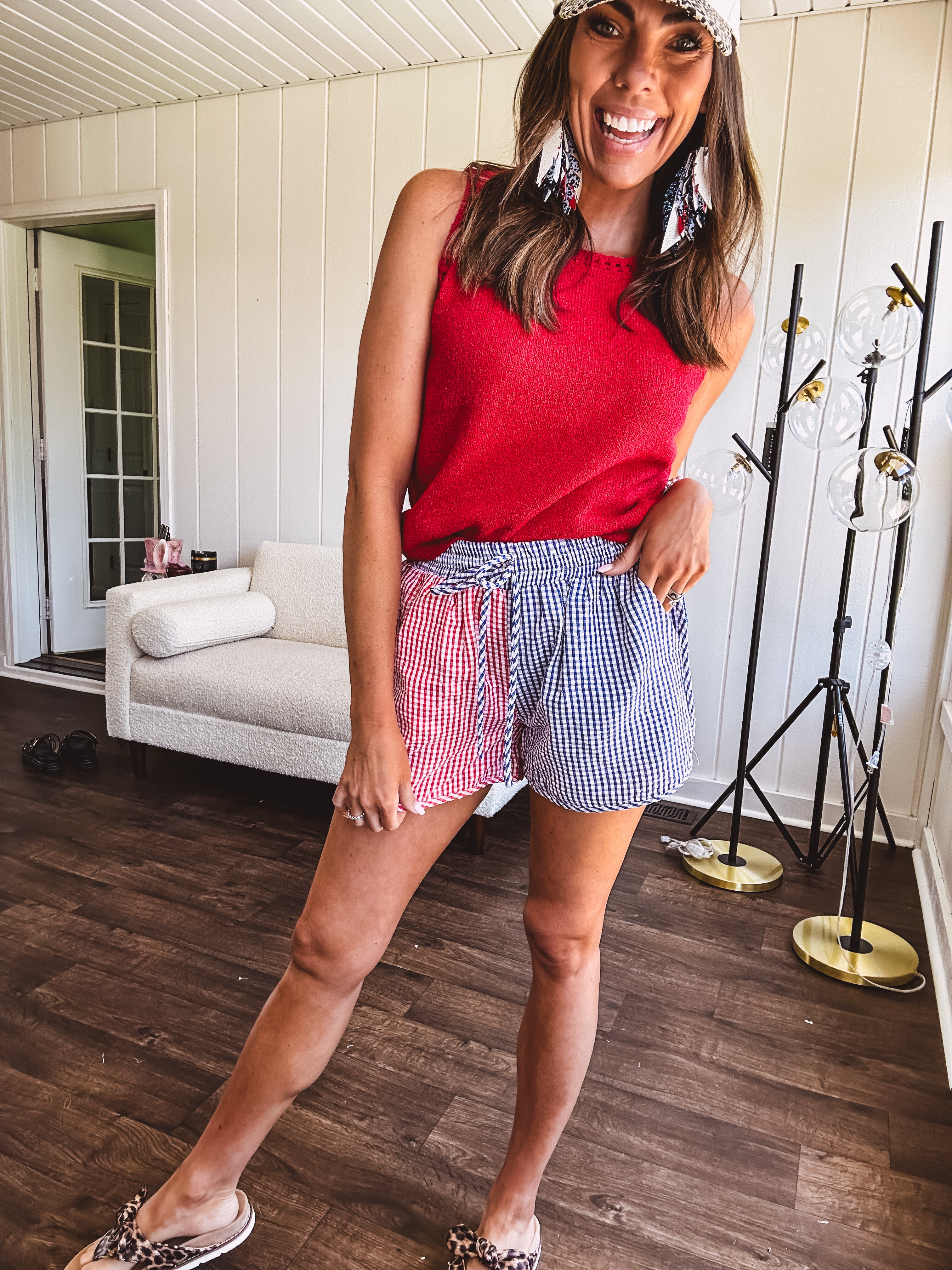 Soft, lightweight knit tank with wide straps and crochet detail at the trim.