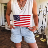 Thin, ivory ribbed textured V neck tank with American flag crochet applique on the front.