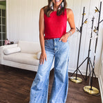 Light wash extreme wide leg zero stretch denim with an extra panel at the knee and unique knee darts.