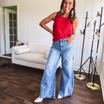 Light wash extreme wide leg zero stretch denim with an extra panel at the knee and unique knee darts.