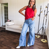 Light wash extreme wide leg zero stretch denim with an extra panel at the knee and unique knee darts.