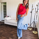 Light wash extreme wide leg zero stretch denim with an extra panel at the knee and unique knee darts.