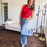 Light wash extreme wide leg zero stretch denim with an extra panel at the knee and unique knee darts.