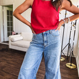 Soft, lightweight knit tank with wide straps and crochet detail at the trim.