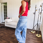Light wash extreme wide leg zero stretch denim with an extra panel at the knee and unique knee darts.