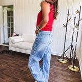 Light wash extreme wide leg zero stretch denim with an extra panel at the knee and unique knee darts.