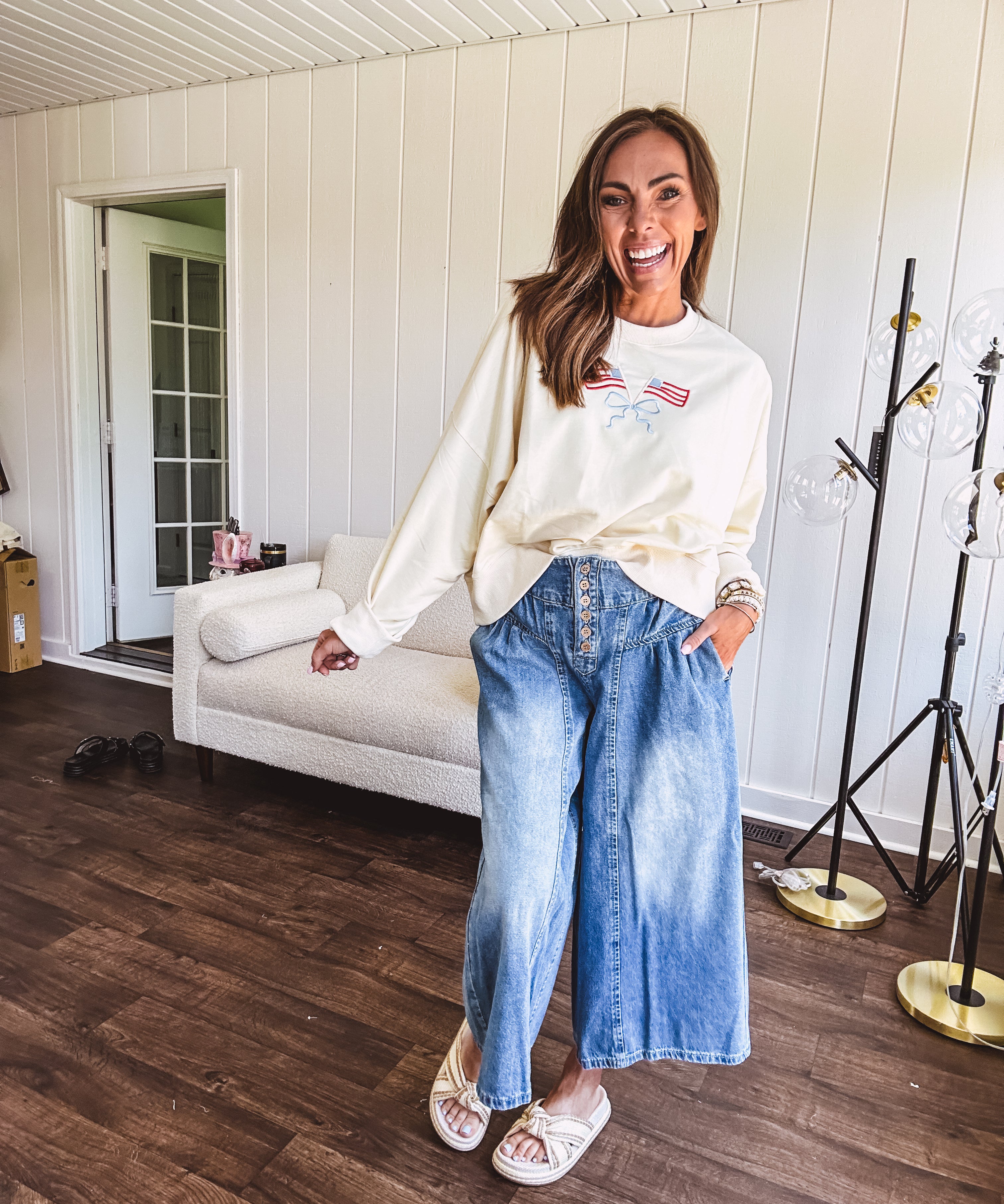 Light wash wide leg denim culottes with pleating at the top, button fly and pockets.