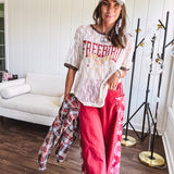 Floral lace sheer tee with brown trim throughout and red "FREEBIRD" and cream eagle graphic.