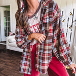 Oversized red, brown and blue plaid button down top.