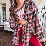 Oversized red, brown and blue plaid button down top.