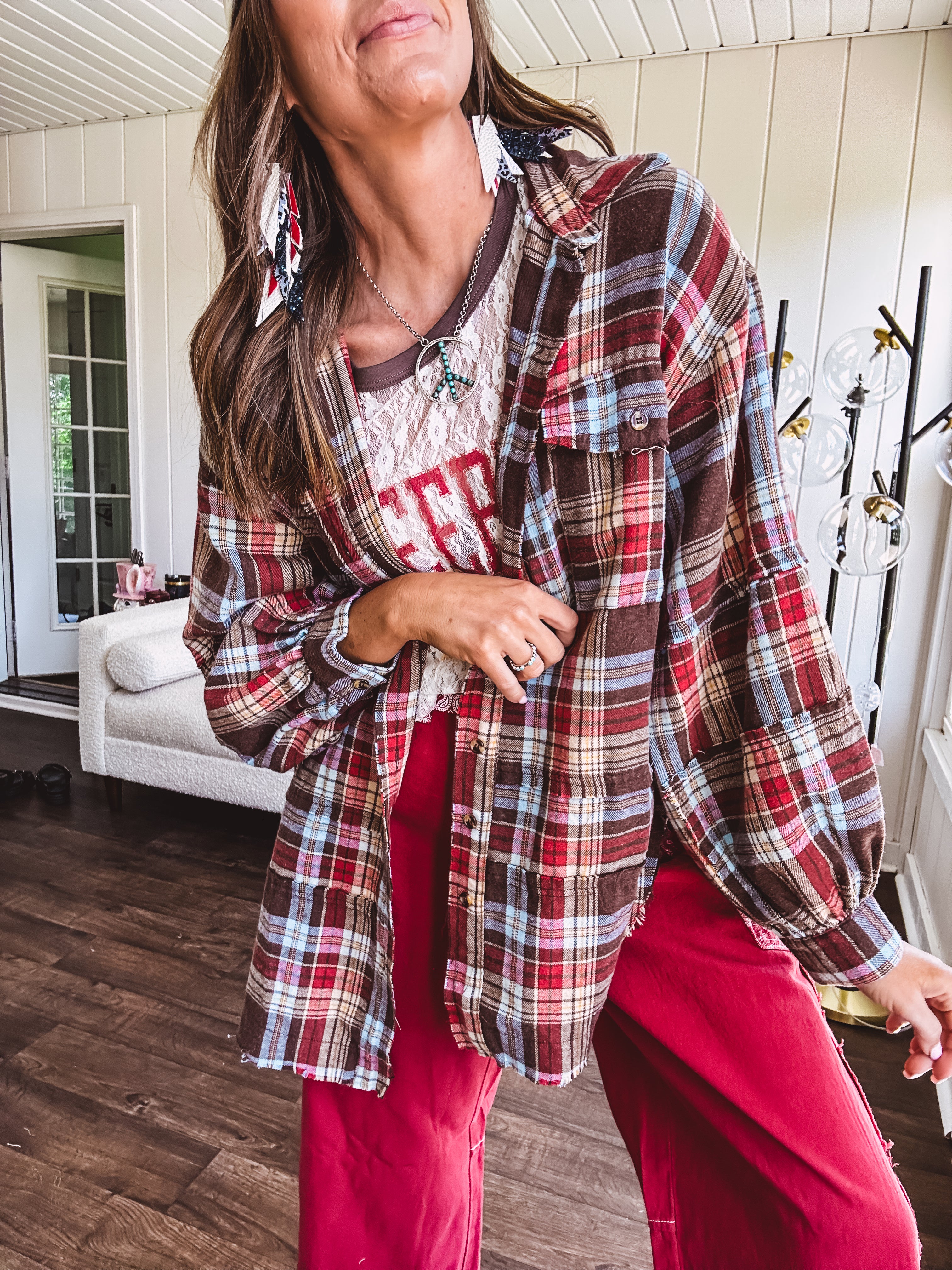 Oversized red, brown and blue plaid button down top.
