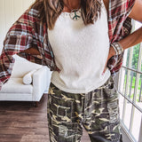 Soft, lightweight knit tank with wide straps and crochet detail at the trim.
