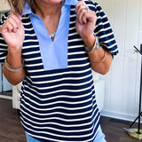 Navy and cream striped soft, stretchy top with light blue cotton collar and V neck with cuffed puff sleeves.