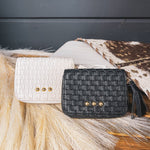 Small leather woven change purse, card holder, wallet in black or white with matching tassel and three gold balls on the front.