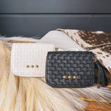 Small leather woven change purse, card holder, wallet in black or white with matching tassel and three gold balls on the front.
