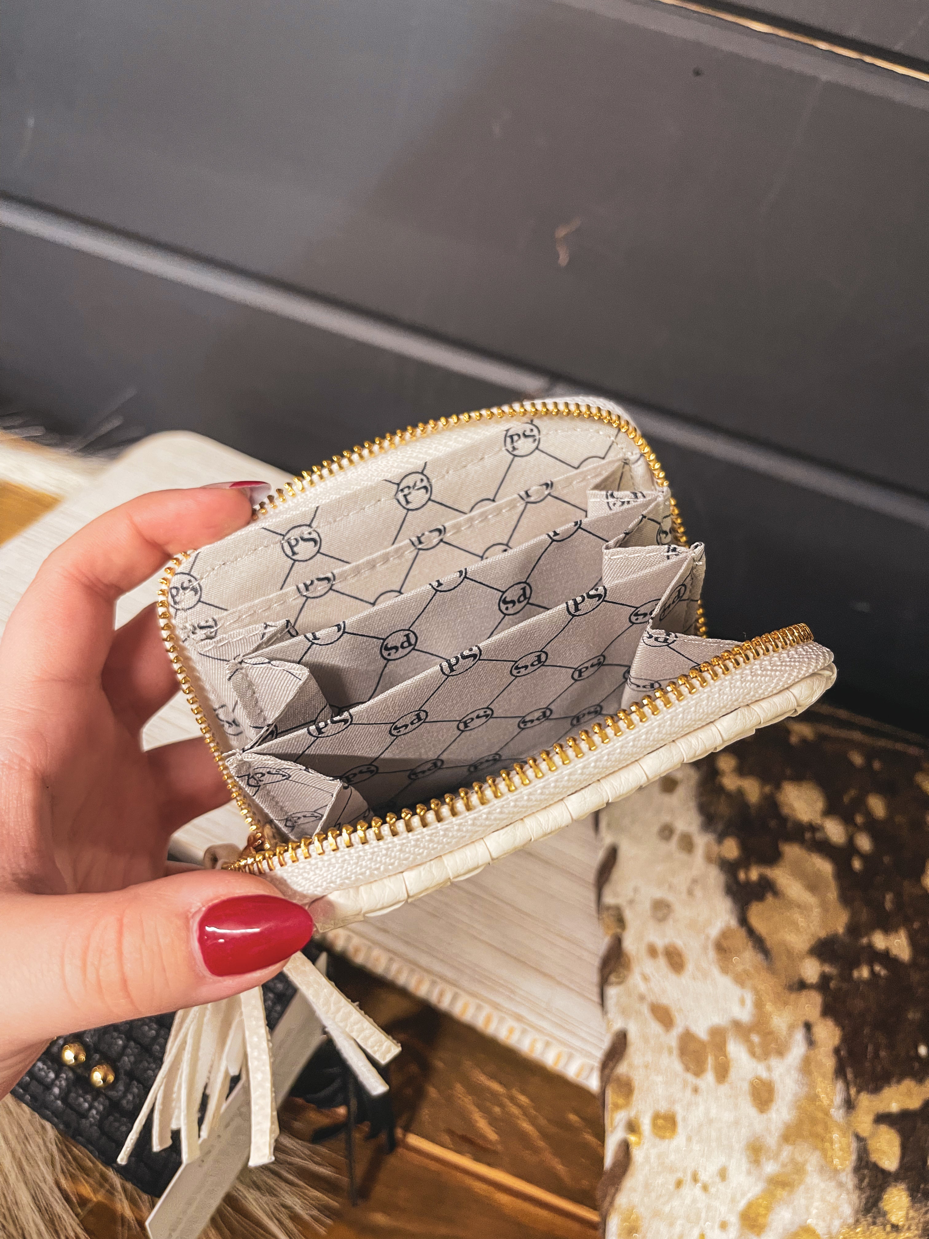 Small leather woven change purse, card holder, wallet in black or white with matching tassel and three gold balls on the front.