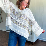 Soft, feminine and fun, this cream mixed textured pullover is your new go-to for effortless boho vibes. Lace details play beautifully with muted yellow and purple floral inserts, while 3/4 wide sleeves and matching rope drawstrings add that perfect playful touch. The relaxed, oversized fit? Perfect.
