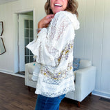 Soft, feminine and fun, this cream mixed textured pullover is your new go-to for effortless boho vibes. Lace details play beautifully with muted yellow and purple floral inserts, while 3/4 wide sleeves and matching rope drawstrings add that perfect playful touch. The relaxed, oversized fit? Perfect.