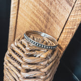 Authentic Sterling Silver bangle featuring silver balls on an oxidized background.