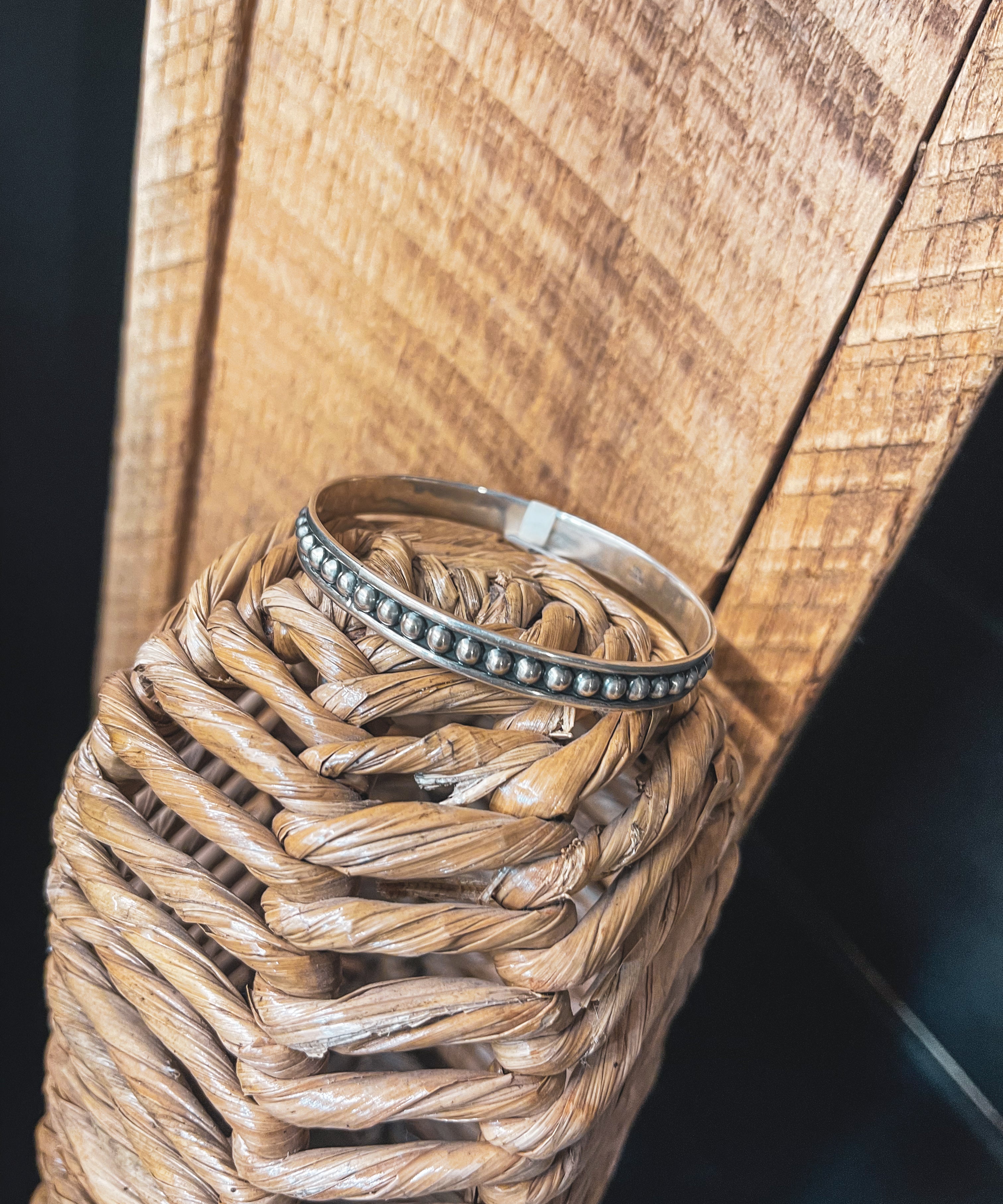 Authentic Sterling Silver bangle featuring silver balls on an oxidized background.