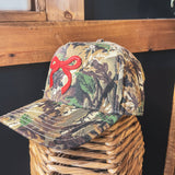 Canvas structured trucker hat with puff embroidery in various styles and coordinating bills.