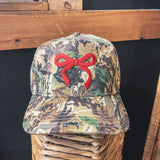 Canvas structured trucker hat with puff embroidery in various styles and coordinating bills.