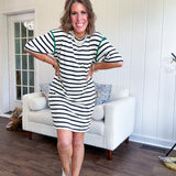 Black and cream striped short sleeved mini dress with green crochet trim at the shoulders. Has pockets.