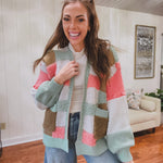 Mixed textured open front cardigan in sage, coral, taupe and ivory checkered pattern with pockets.