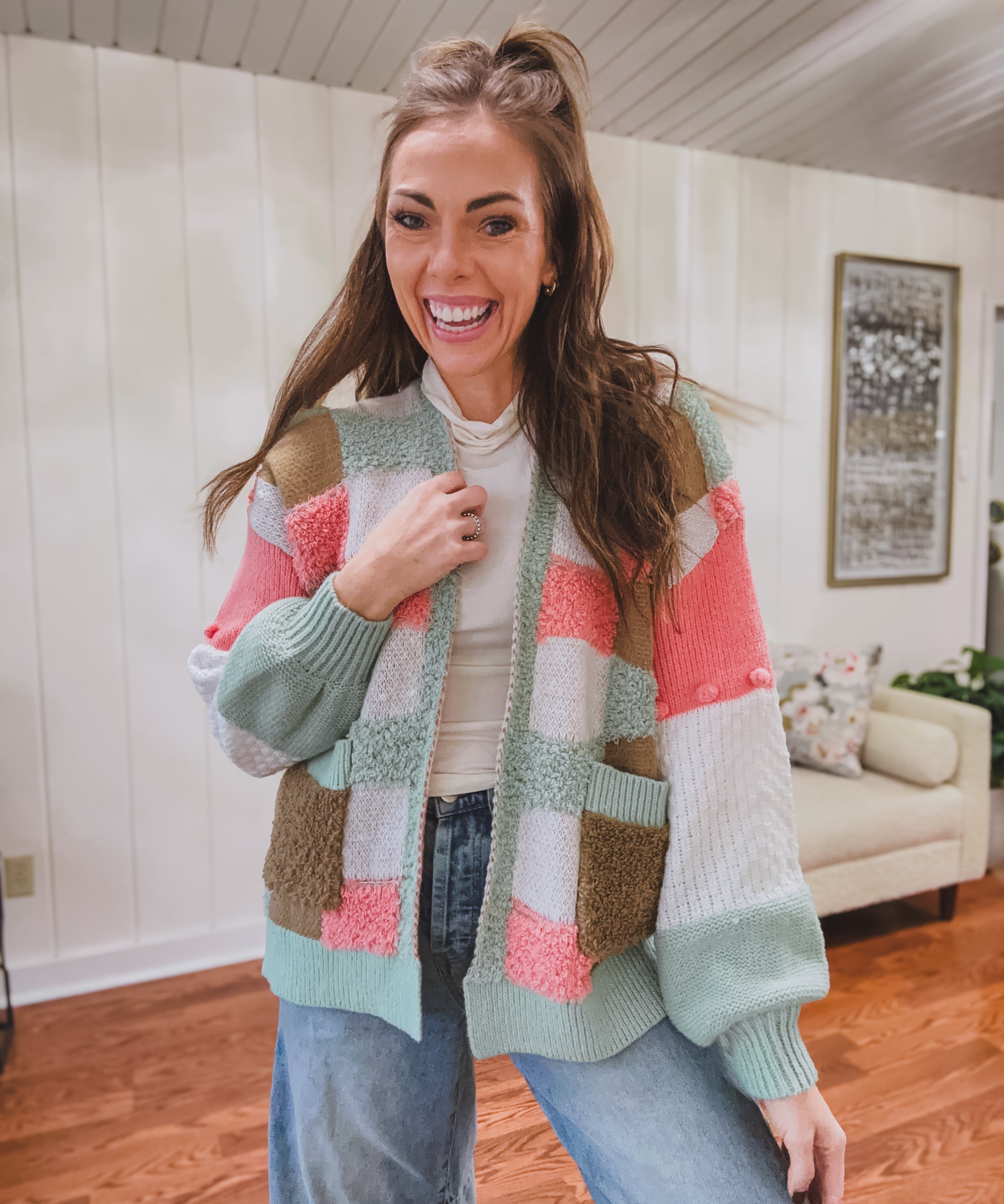 Mixed textured open front cardigan in sage, coral, taupe and ivory checkered pattern with pockets.