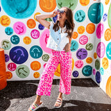 hot pink leopard print pops against a soft pink backdrop, while the cropped wide-leg silhouette keeps things fresh and fashion-forward. Double button and zipper closure, front and back pockets