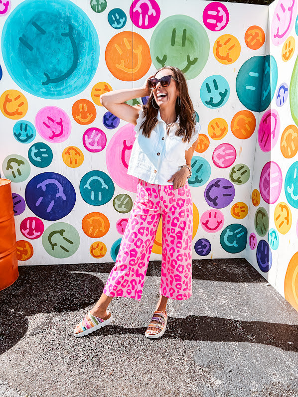 hot pink leopard print pops against a soft pink backdrop, while the cropped wide-leg silhouette keeps things fresh and fashion-forward. Double button and zipper closure, front and back pockets